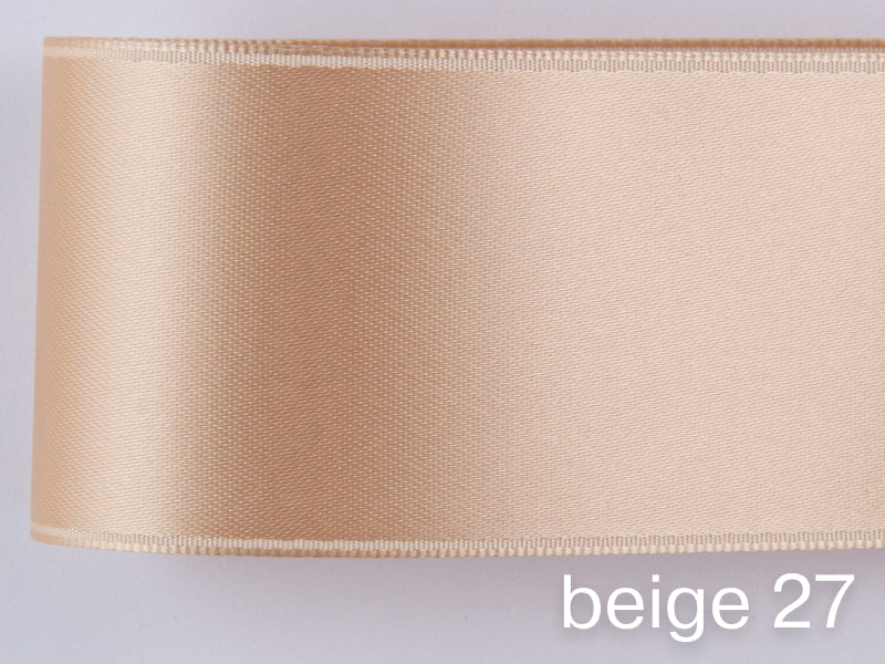 Doubleface satin ribbon in Swiss quality. 7 shades of brown with a delicate shimmering depth of color in 7 widths. Pollutant-free.