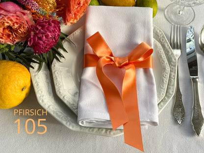 Doubleface satin ribbon in Swiss quality. 7 shades of orange with a delicate shimmering depth of color in 7 widths. Pollutant-free.