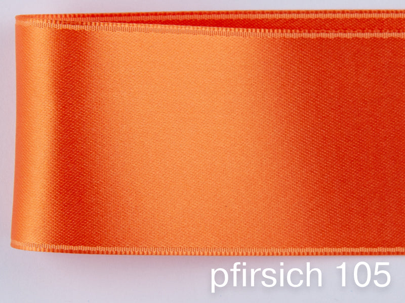 Doubleface Satinband in Schweizer Qualität. 7 Orangetöne mit zart schimmernder Farbtiefe in 7 Breiten. Schadstofffrei.