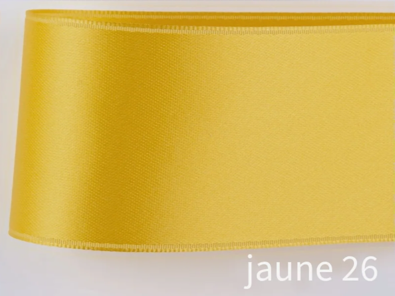 Doubleface satin ribbon in Swiss quality. 10 shades of yellow with a delicate shimmering depth of color in 7 widths. Pollutant-free.