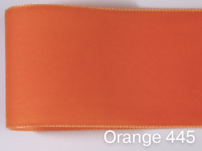 Swiss quality velvet ribbon. 4 shades of orange with a delicately shimmering depth of color in 7 widths. Free of harmful substances.