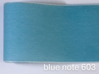 Swiss quality velvet ribbon. 7 light blue tones with delicately shimmering depth of color in 7 widths. Free of harmful substances.