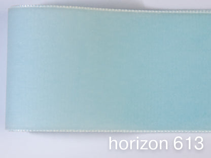 Swiss quality velvet ribbon. 7 light blue tones with delicately shimmering depth of color in 7 widths. Free of harmful substances.