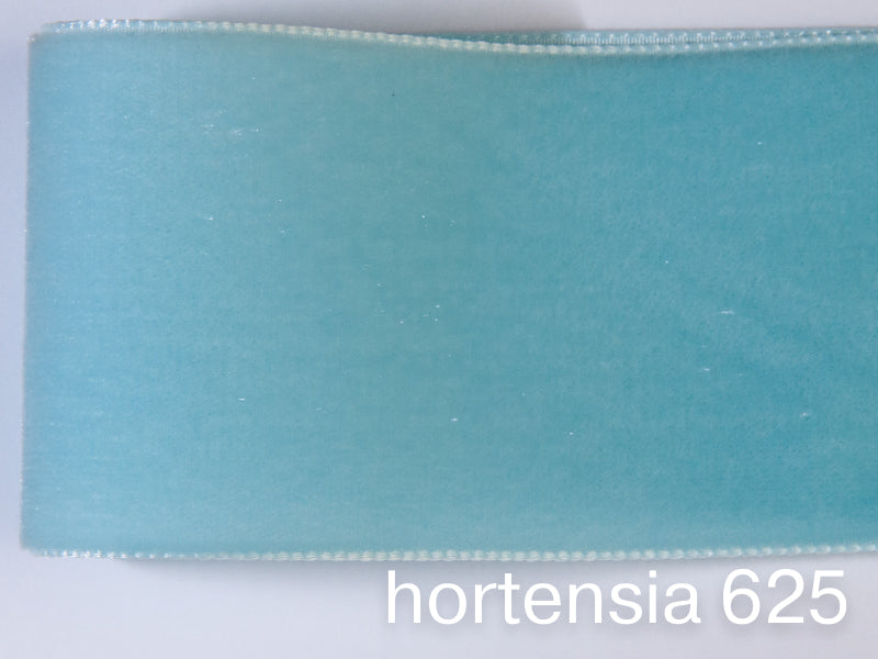 Swiss quality velvet ribbon. 7 light blue tones with delicately shimmering depth of color in 7 widths. Free of harmful substances.