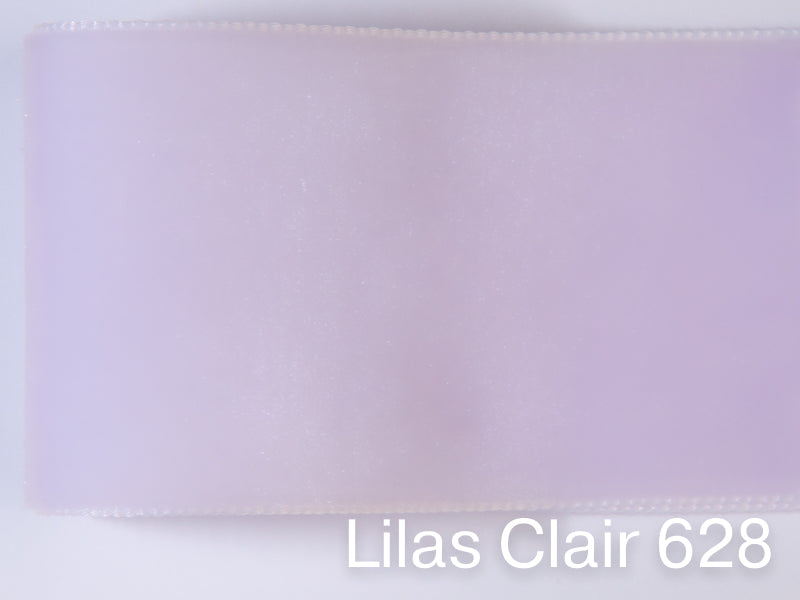 Nastro di velluto di qualità svizzera. 7 tonalità di viola con una profondità di colore delicatamente scintillante in 7 larghezze. Privo di sostanze nocive.