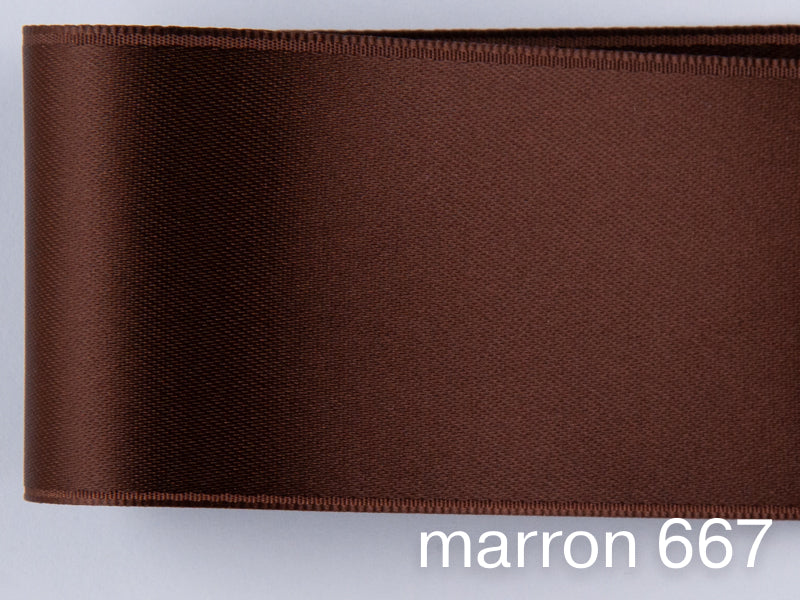 Doubleface satin ribbon in Swiss quality. 7 shades of brown with a delicate shimmering depth of color in 7 widths. Pollutant-free.