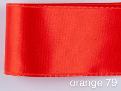 Doubleface Satinband in Schweizer Qualität. 7 Orangetöne mit zart schimmernder Farbtiefe in 7 Breiten. Schadstofffrei.