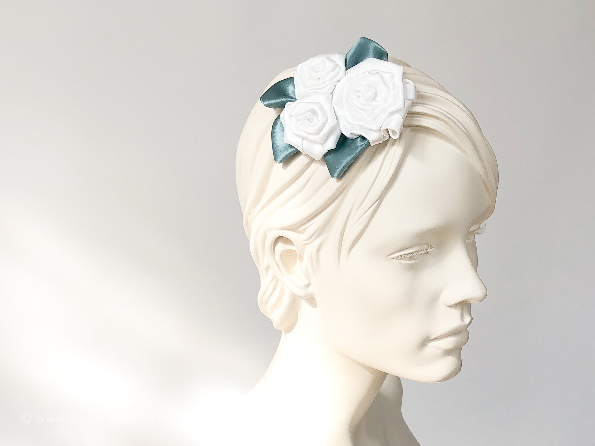 Fascinator, Hair flowers with roses in white, Off white, cream and green leaves.