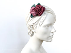 Fascinator Hair flowers with Roses with dusty pink and green leaves.