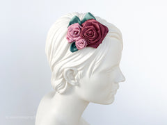 Fascinator Hair flowers with Roses with dusty pink and green leaves.