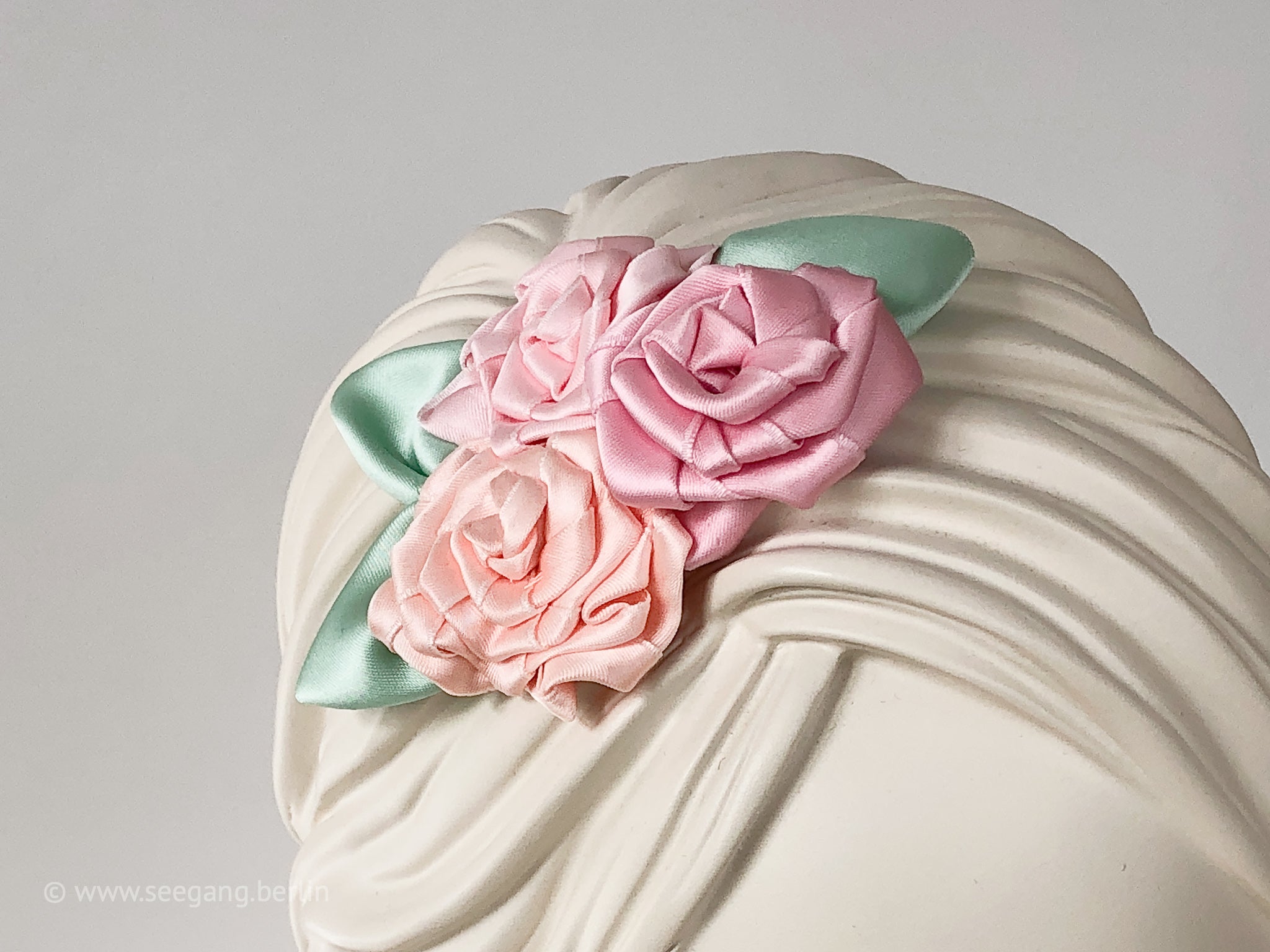 Fascinator, Hair flowers with roses in sorbet colors and mint colored leaves. Fresh!