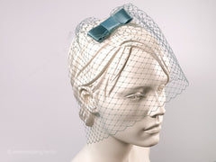 BIRDCAGE - VEIL HEADDRESS IN SHADES LIKE DARK GREEN, SAGE AND PETROL TONES