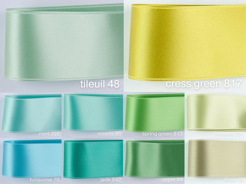 Satin ribbon in green, jade, turquoise, aqua, emerald and 100 colours in swiss quality. Widths from 0.1 to 2.0 inch. For tailoring, easter wreaths.