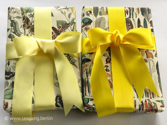 Doubleface Satinband in Schweizer Qualität. 10 Gelb- und Goldtöne mit zart schimmernder Farbtiefe in 7 Breiten. Schadstofffrei.