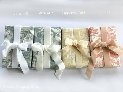 Swiss quality velvet ribbon. 7 shades of white with delicately shimmering color depth in 7 widths. Free of harmful substances.