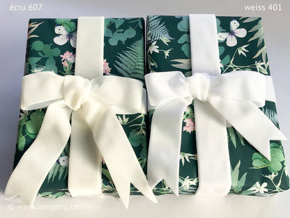 Swiss quality velvet ribbon. 7 shades of white with delicately shimmering color depth in 7 widths. Free of harmful substances.