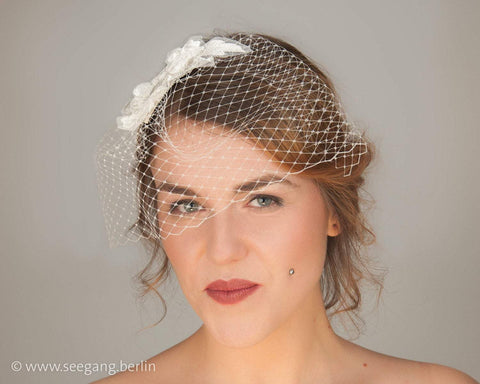 BIRDCAGE - BRIDAL VEIL HEADDRESS WITH LACE FLOWERS IN OFF WHITE, CREME OR IVORY COLOUR © Seegang Berlin