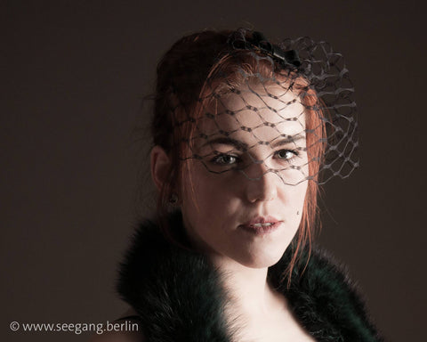 BIRDCAGE - VEIL HEADDRESS WITH A LEATHER BOW FOR DARK OCCASIONS © Seegang Berlin