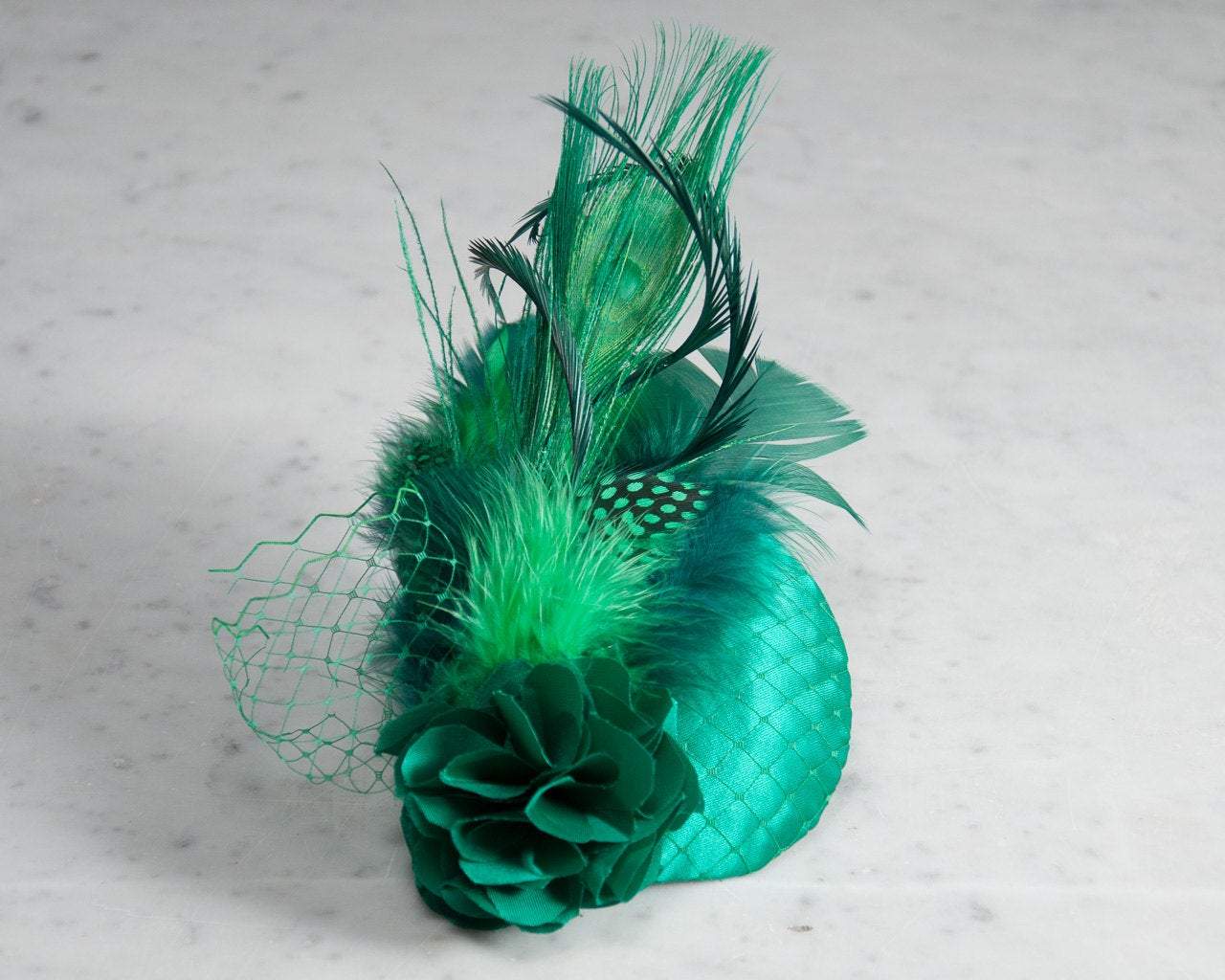 FASCINATOR - A GLAMOROUS BILLIARD BOTTLE GREEN HAT © Seegang Berlin