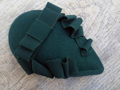 FASCINATOR - DROP SHAPE HEADDRESS WITH DRAPED WITH VELVET RIBBON IN DARK GREEN © Seegang Berlin