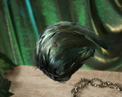 FASCINATOR - HEADPIECE WITH GREEN SHIMMERING BLACK FEATHERS © Seegang Berlin