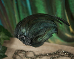 FASCINATOR - HEADPIECE WITH GREEN SHIMMERING BLACK FEATHERS © Seegang Berlin