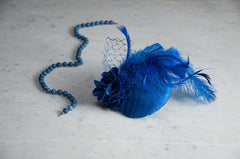 FASCINATOR - OUT IN THE BLUE HEADPIECE WITH CURLED FEATHERS © Seegang Berlin