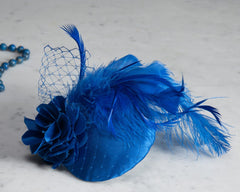 FASCINATOR - OUT IN THE BLUE HEADPIECE WITH CURLED FEATHERS © Seegang Berlin